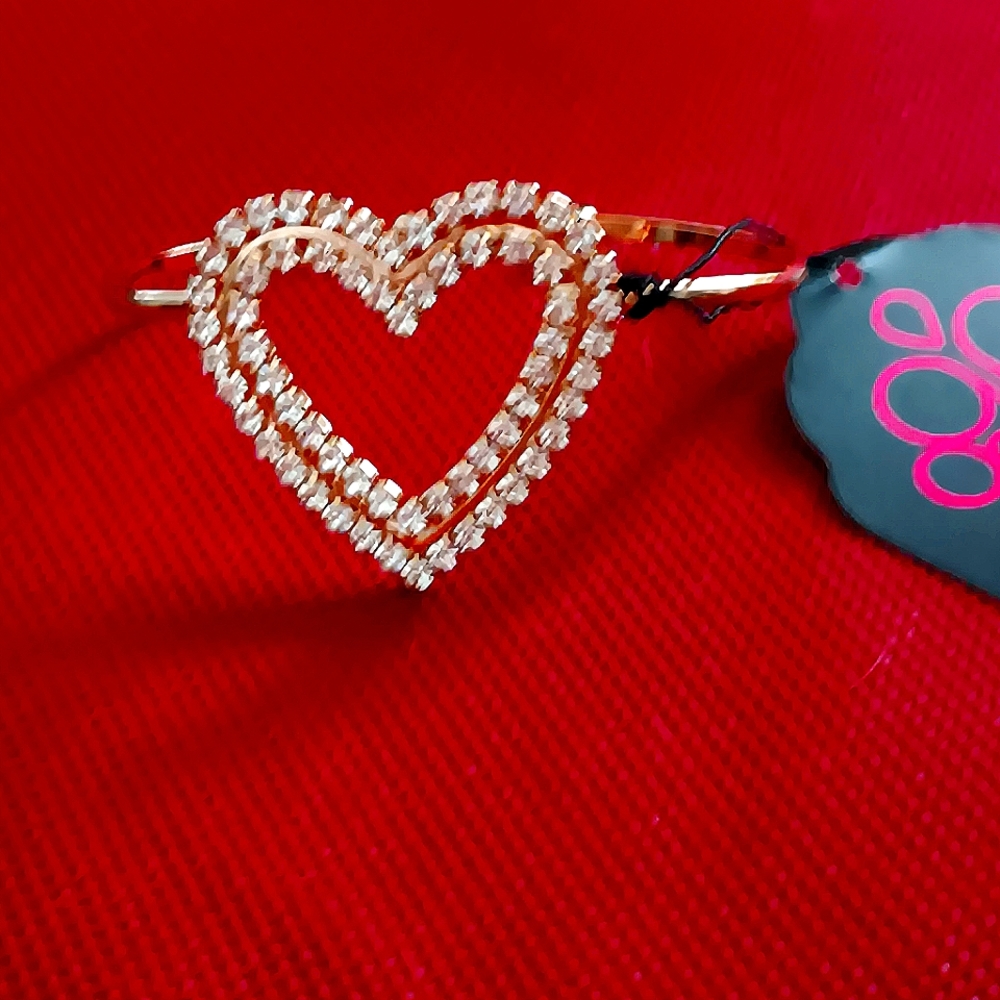Paparazzi crystal heart gold tone open bracelet.